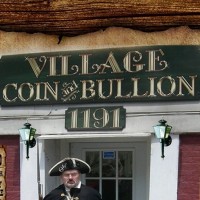 Village Coin &amp; Bullion Logo