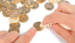 Why Do People Still Clean Their Coins?
