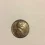 1940 D wheat back penny with a like Star next to mouth