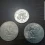 1980 Kennedy Half Dollar and two Eisenhower Dollars