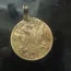 1898 gold 10 Dollar coin with Liberty head and 11 stars on the front and Mintmark D on the backside