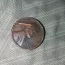 Please has anyone heard or seen this type of error? 1942 with doubling of Lincoln head? But it&#039;s stuck onto another penny? Is it worth the it&#039;s printed on?? Please help, thank you