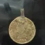 1898 gold 10 Dollar coin with Liberty head and 11 stars on the front and Mintmark D on the backside