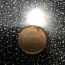 I have a 1944 wheat penny that sticks to a magnet. It also has a rim around it. Do you think it is worth anything?